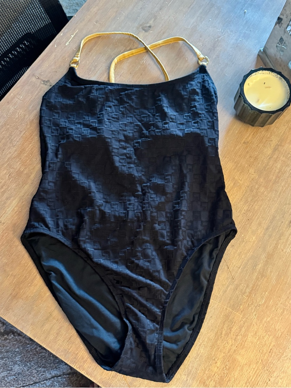 Classic Black One-Piece Swimsuit with Gold Straps